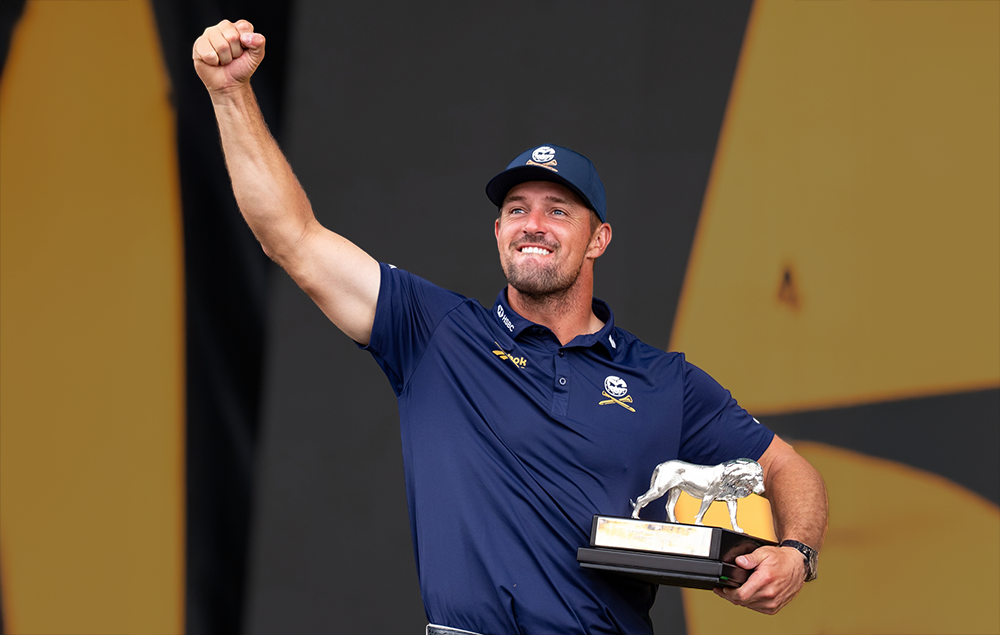 Bryson DeChambeau holding LIV South Africa trophy